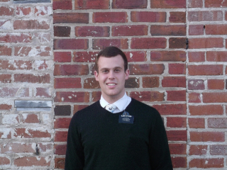 There is this brick wall in downtown that everyone takes pictures in front of, so we did too!